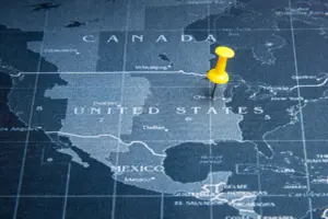 Yellow pin on the world map pin to United States of america coun